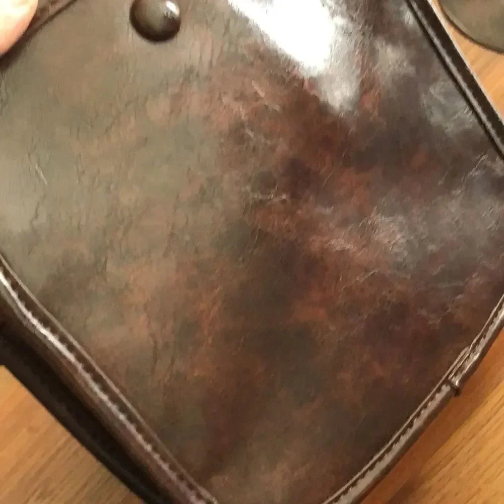 Anthropologie Tortoiseshell brown Crossbody bag.